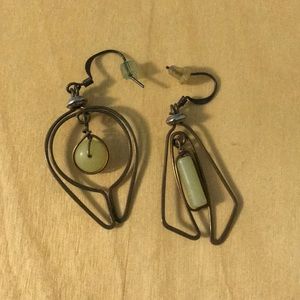 Gold metal earrings with green beads.